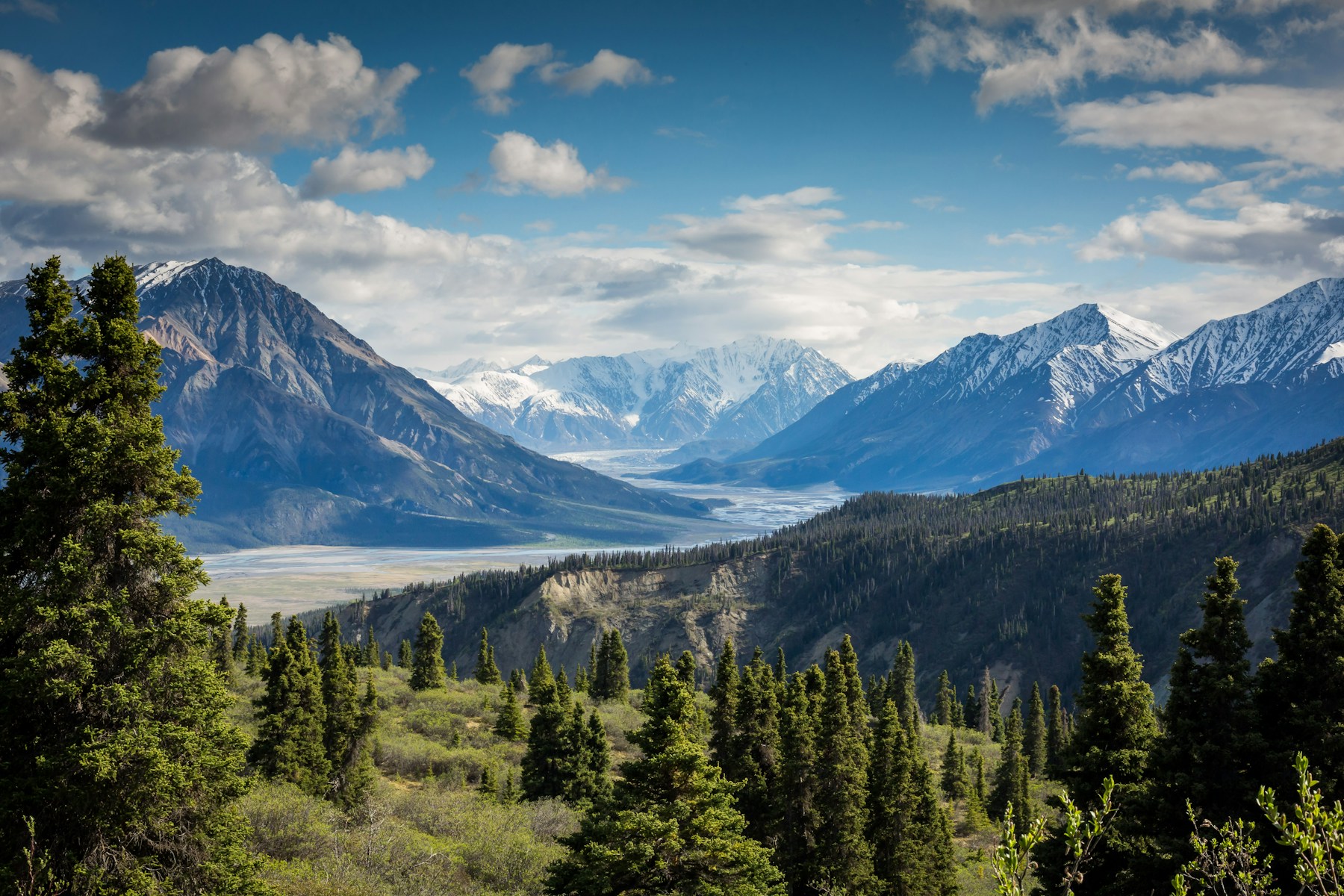 Snow-covered mountains stretching toward the horizon